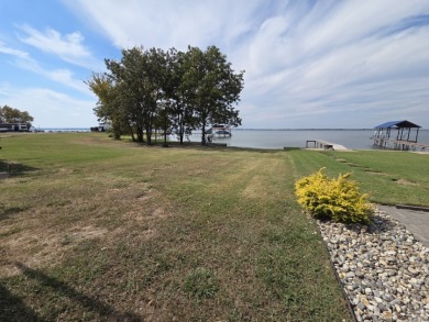 Waterfront lake lot on beautiful Peninsula Point - photo 18