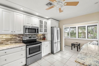 Spacious 3-bedroom, 2-bath condo featuring wood-look tile - photo 14