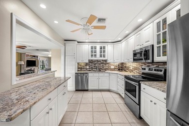 Spacious 3-bedroom, 2-bath condo featuring wood-look tile - photo 17