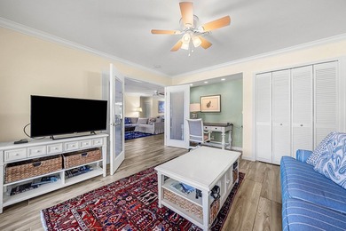 Spacious 3-bedroom, 2-bath condo featuring wood-look tile - photo 22