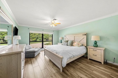 Spacious 3-bedroom, 2-bath condo featuring wood-look tile - photo 23