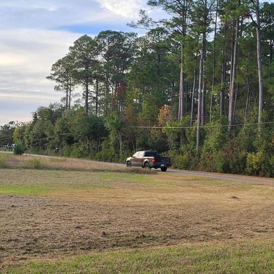 1/2 an acre with a view of Blackwater Bay. The front of the - photo 2