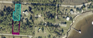 1/2 an acre with a view of Blackwater Bay. The front of the - photo 3