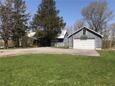 LOCATION LOCATION!!! Wake up to the fresh smell of doughnuts - Lake Home For Sale in Watertown, New York