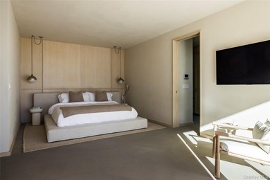 An architecturally significant modern retreat set on two private - photo 14