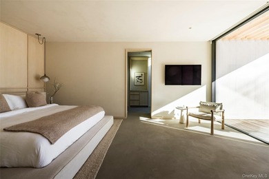 An architecturally significant modern retreat set on two private - photo 15