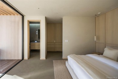 An architecturally significant modern retreat set on two private - photo 19