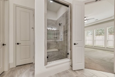 This well-maintained brick-and-stone home offers a tandem 3-car - photo 22