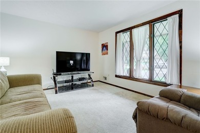 OPEN THE DOOR TO EASY ONE-FLOOR LIVING! This well-maintained - photo 6