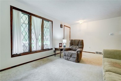 OPEN THE DOOR TO EASY ONE-FLOOR LIVING! This well-maintained - photo 7