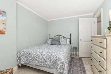 This beautifully maintained three-bedroom, two-bath condo at