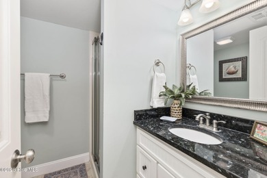 This beautifully maintained three-bedroom, two-bath condo at