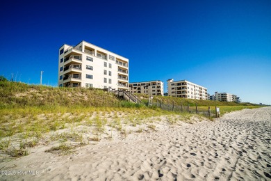 This beautifully maintained three-bedroom, two-bath condo at