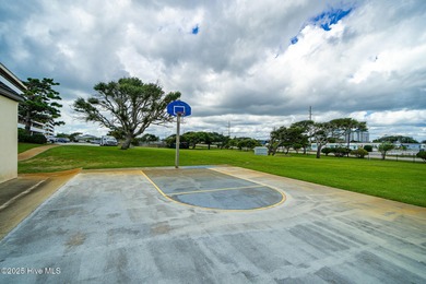 This beautifully maintained three-bedroom, two-bath condo at