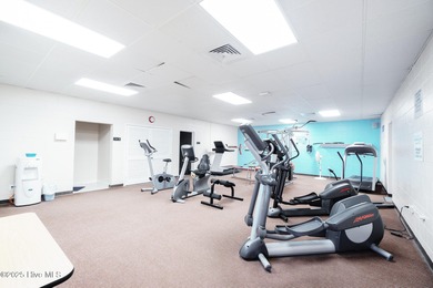 This beautifully maintained three-bedroom, two-bath condo at