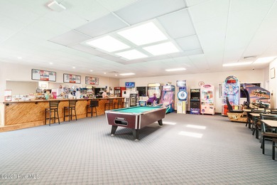 This beautifully maintained three-bedroom, two-bath condo at