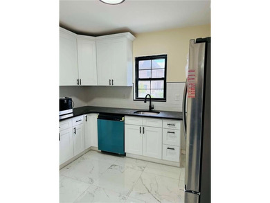This is a beautifully fully renovated single-family home - photo 3