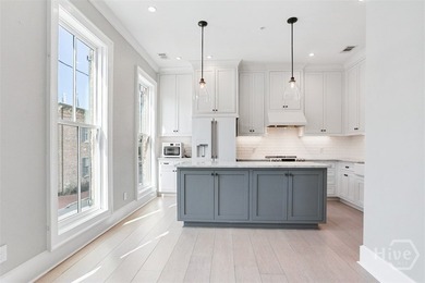 Discover refined urban living at 407 E McDonough St in - photo 15