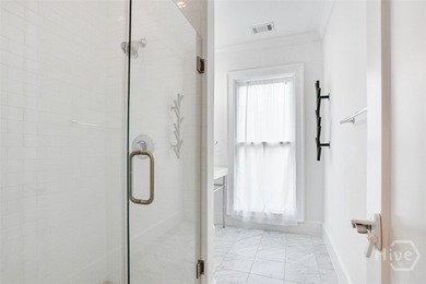 Discover refined urban living at 407 E McDonough St in - photo 32