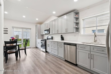 Welcome to your next chapter in this beautifully renovated - photo 9
