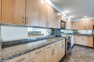 Rarely available and highly sought-after  one of only 12 units