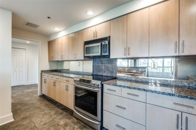 Rarely available and highly sought-after  one of only 12 units