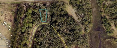 Beautiful wooded .17 acre building lot in desirable Cumberland - photo 1