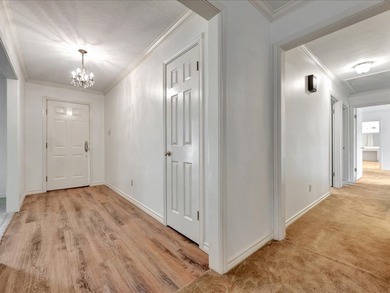 This well maintained home is situated on 13.86 acres.  Inside