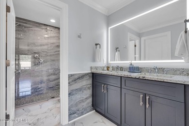 Custom-built in 2023 with water views, this meticulously - photo 29
