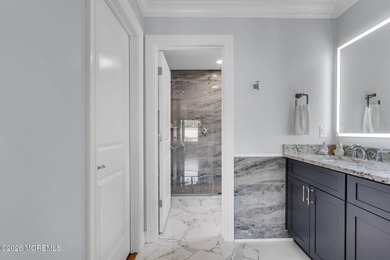 Custom-built in 2023 with water views, this meticulously - photo 30