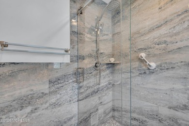 Custom-built in 2023 with water views, this meticulously - photo 31