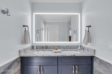 Custom-built in 2023 with water views, this meticulously - photo 33