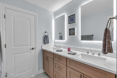Custom-built in 2023 with water views, this meticulously - photo 37