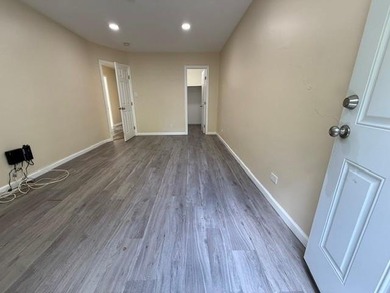 Well-maintained two-family brick home located in the highly - photo 8