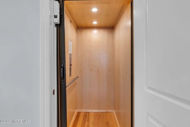 Custom-built in 2023 with water views, this meticulously - photo 38