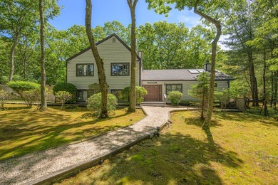 On a picturesque property in the Squire Woods neighborhood, this - photo 1