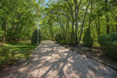 On a picturesque property in the Squire Woods neighborhood, this - photo 3