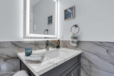 Custom-built in 2023 with water views, this meticulously - photo 49