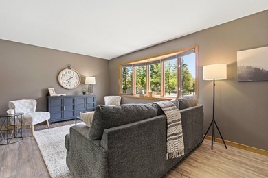This spacious multi-level home in Eau Claire is full of - photo 4