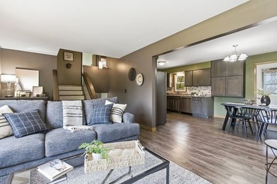 This spacious multi-level home in Eau Claire is full of - photo 5