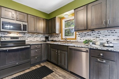 This spacious multi-level home in Eau Claire is full of - photo 7