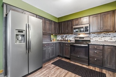 This spacious multi-level home in Eau Claire is full of - photo 8