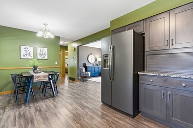 This spacious multi-level home in Eau Claire is full of - photo 9