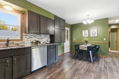This spacious multi-level home in Eau Claire is full of - photo 10