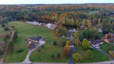 Nestled on over 6 acres along the scenic Menominee River, this - photo 3