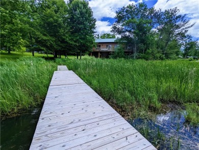 Like new single level raised ranch on Carnegie Bay! This 2 - Lake Home For Sale in Alexandria Bay, New York
