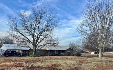 Location Location! This inviting rock home sits on 2.40 acres