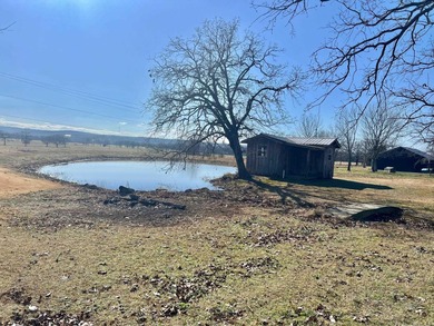 Location Location! This inviting rock home sits on 2.40 acres