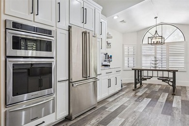 Welcome to elevated lake living, nestled within the sought-after - photo 12