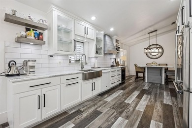 Welcome to elevated lake living, nestled within the sought-after - photo 13